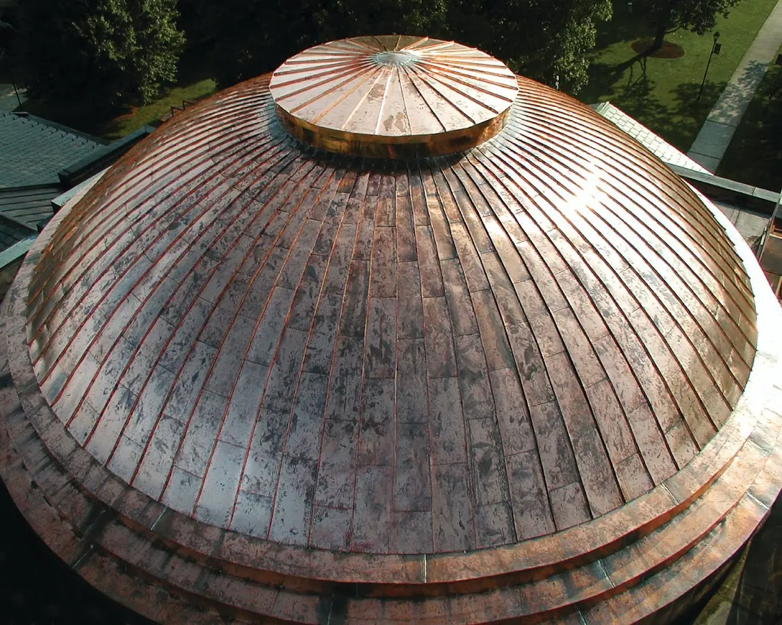 Craftsman Roofing crew installing a new roof in East Newark